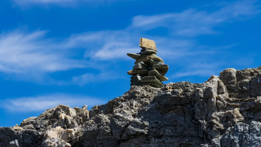 Stone Cairn on Mountain Peak
